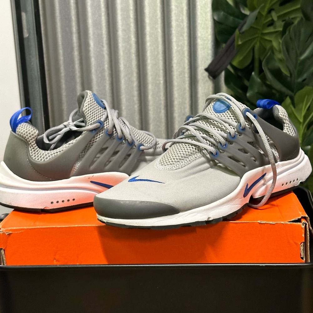 Nike Gray Sneakers with Blue Accents